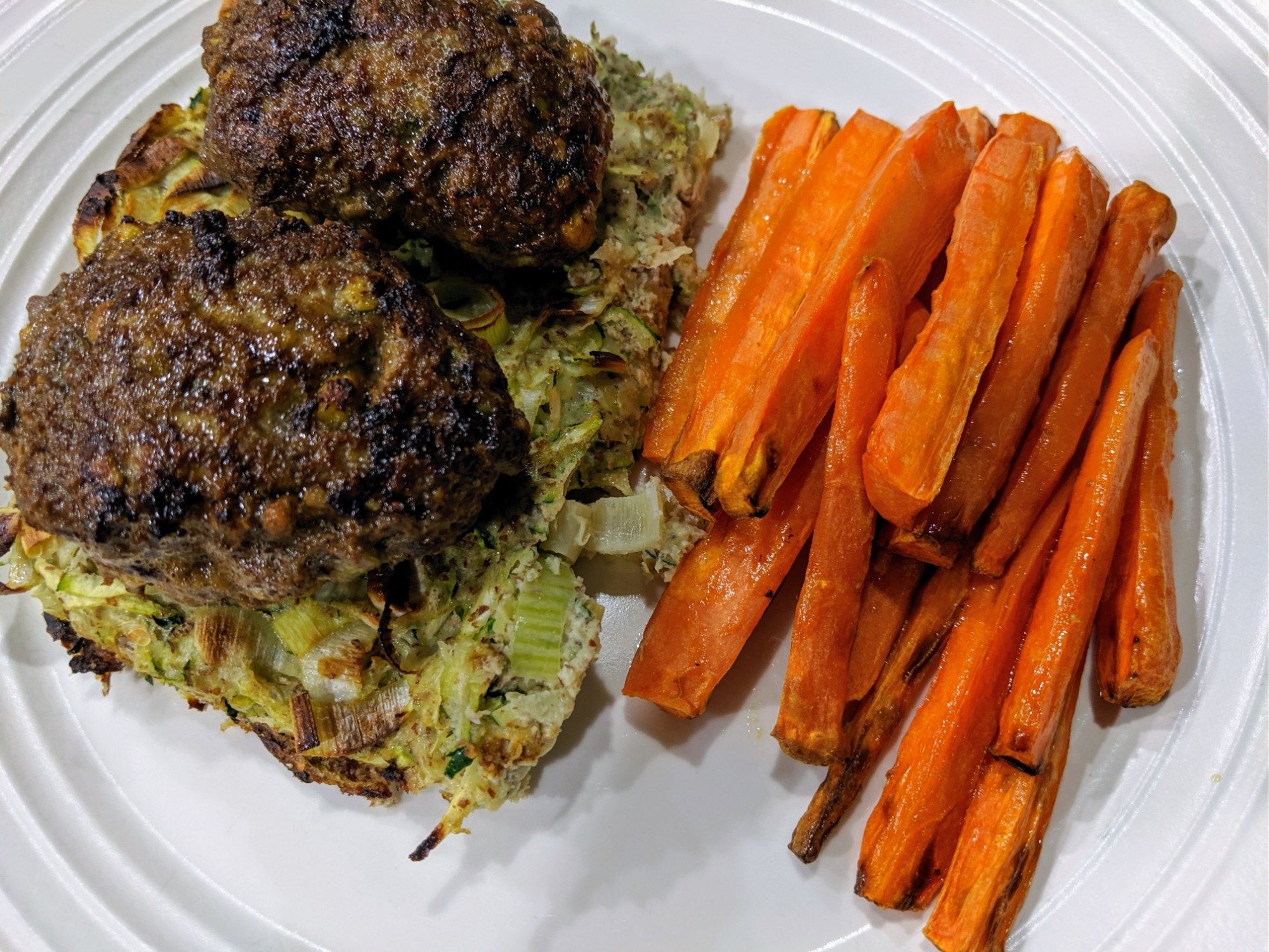 Moroccan Lamb Patties over Zucchini Bake with Carrot Fries